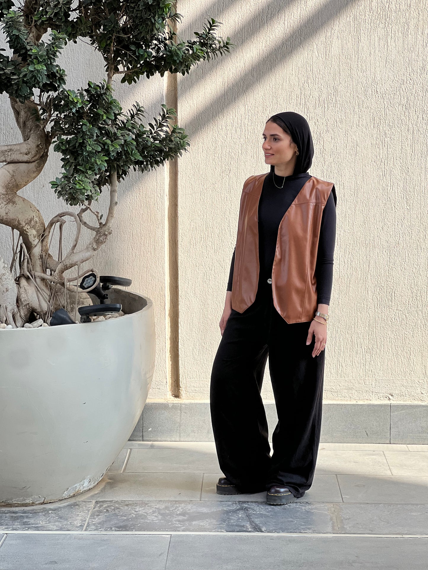 Reverse camel x black vest