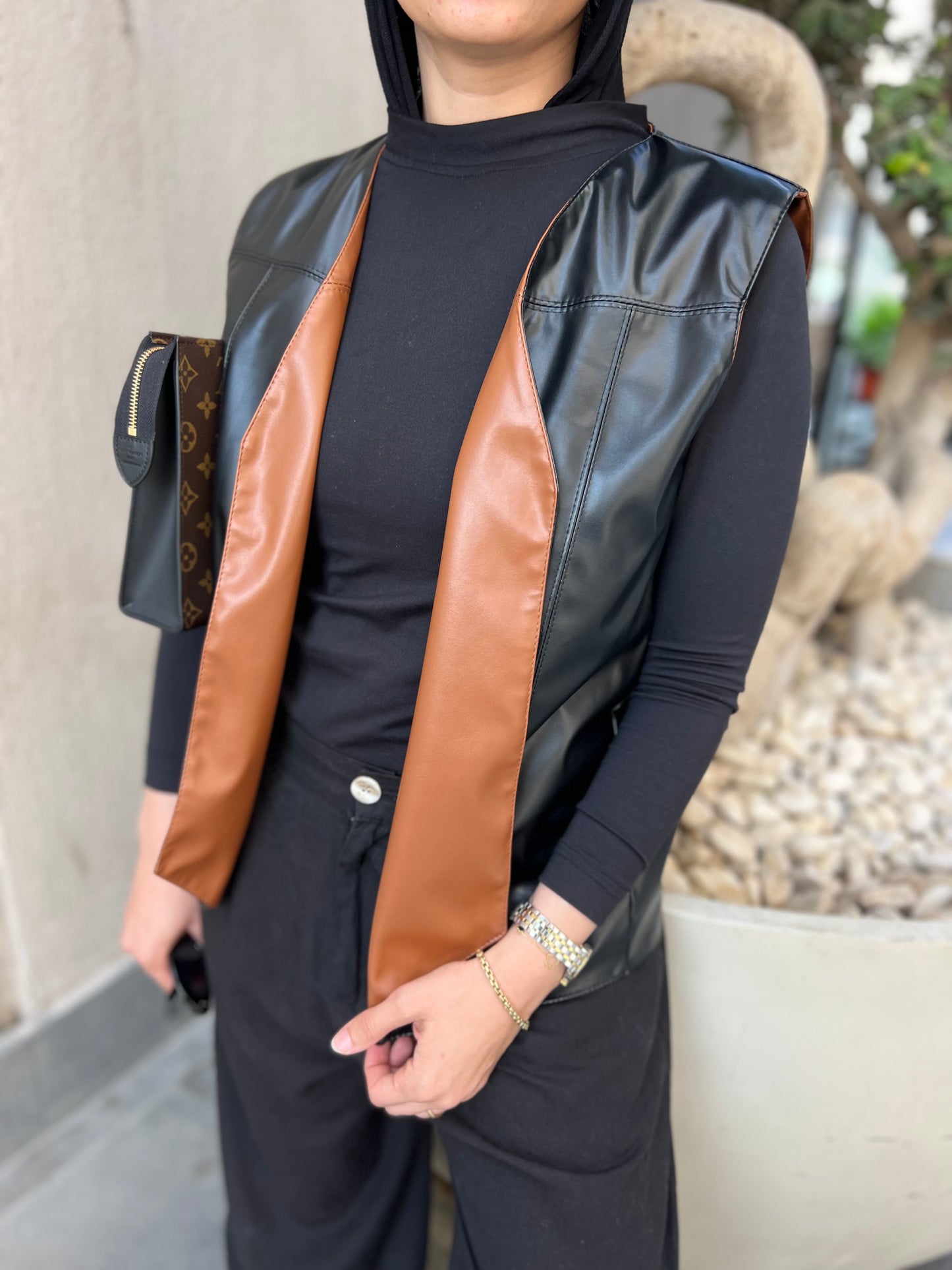 Reverse camel x black vest