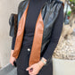 Reverse camel x black vest