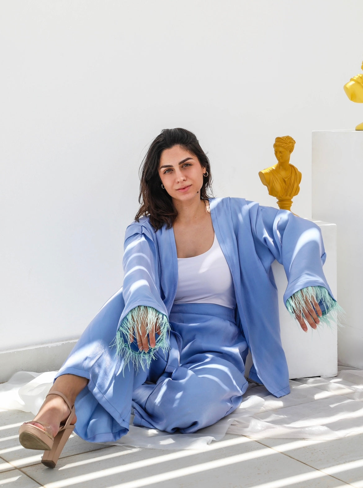 The shimmer draped shoulder with feathers set